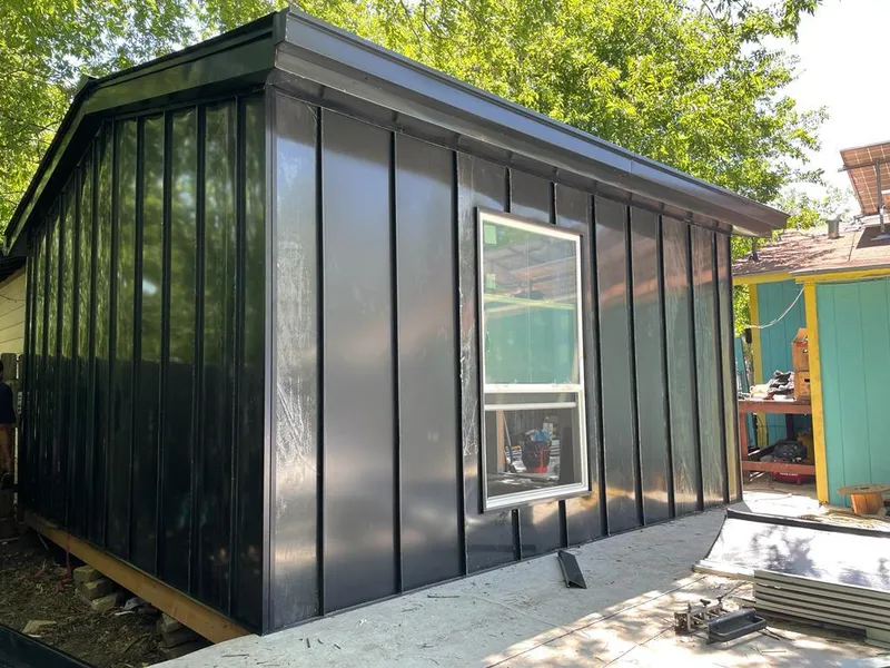 Black standing seam metal wall panels for Metal Roof Installation in Tallahassee